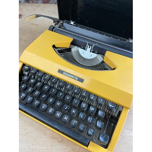 137 - Vintage Bright Yellow Silverette Typewriter