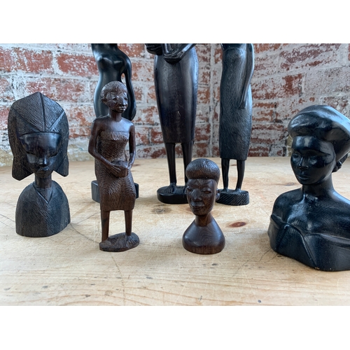 118 - A Collection of Largely Dark Wood Carvings