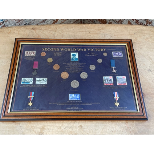 116 - The Sterling Collection Second World War Victory Commemorative Display. Inc. Coins, Stamps & Replica... 