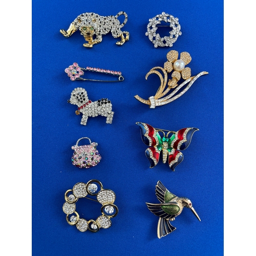 76 - Group Of 9 Brooches