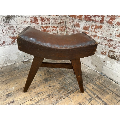 519 - Vintage Leather Saddle Shape Stool