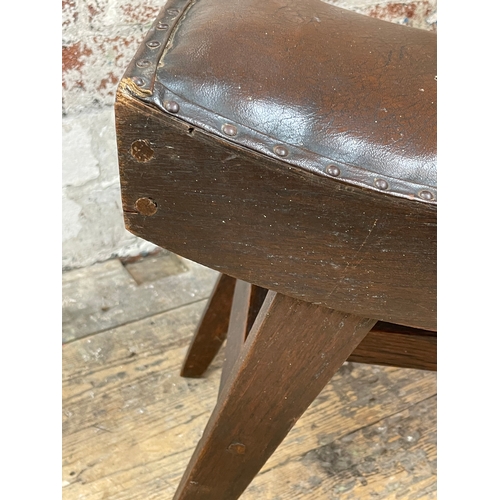 519 - Vintage Leather Saddle Shape Stool