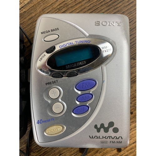 370A - Two Sony Walkman With Accessories