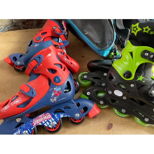 421 - Two Pairs Of Adjustable Inline Roller Skates With Carry Bags