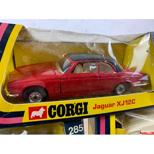 3 - Three Vintage Boxed Corgi Die-cast cars - Jaguar XJ12C, Mercedes-Benz 2400 and Touring Caravan