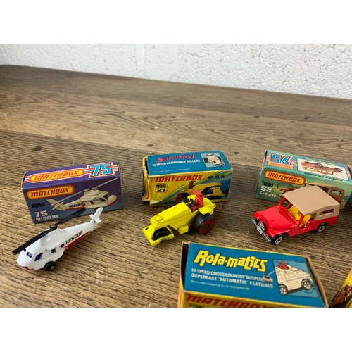 21 - Eight Boxed Matchbox Superfast, and Rola-Matics Cars, Caravans, Rod Roller and Helicopter