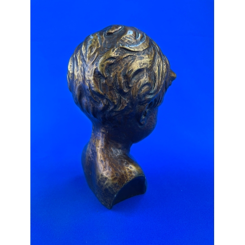 220 - Small Child Bust With Bronze Effect Glaze Marked 529