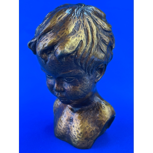 220 - Small Child Bust With Bronze Effect Glaze Marked 529