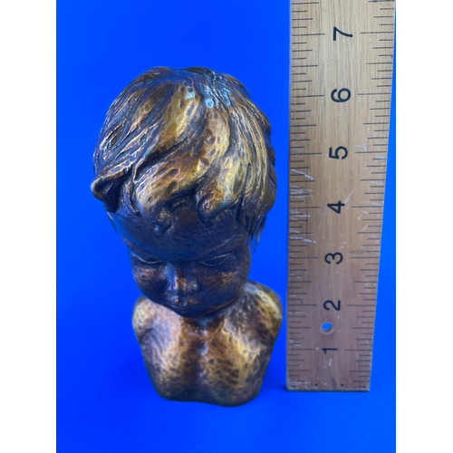 220 - Small Child Bust With Bronze Effect Glaze Marked 529