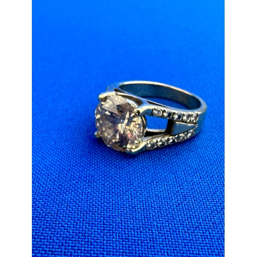 2 - Very Large Approximately 4ct Diamond Set With 20 Smaller Diamonds In A White Gold Ring Of Unknown Ca... 