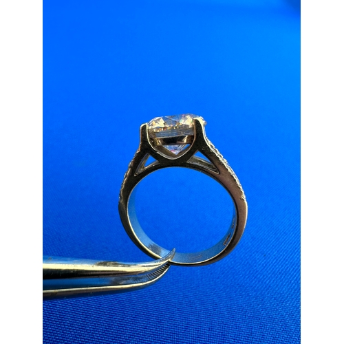 2 - Very Large Approximately 4ct Diamond Set With 20 Smaller Diamonds In A White Gold Ring Of Unknown Ca... 