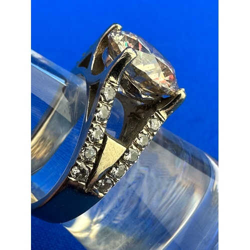 2 - Very Large Approximately 4ct Diamond Set With 20 Smaller Diamonds In A White Gold Ring Of Unknown Ca... 