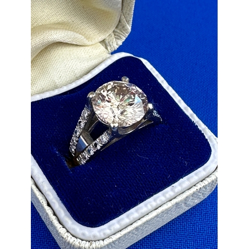 2 - Very Large Approximately 4ct Diamond Set With 20 Smaller Diamonds In A White Gold Ring Of Unknown Ca... 