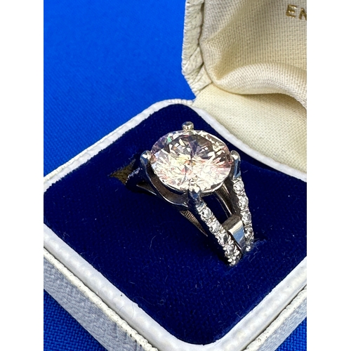 2 - Very Large Approximately 4ct Diamond Set With 20 Smaller Diamonds In A White Gold Ring Of Unknown Ca... 