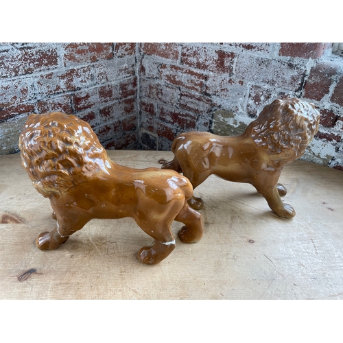 211 - Pair Of Antique Staffordshire Lions. 1 a/f