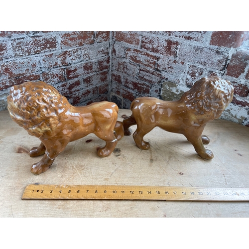 211 - Pair Of Antique Staffordshire Lions. 1 a/f