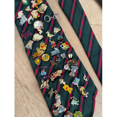 110 - Large Quantity Of Pin Badges Mounted On A Tie