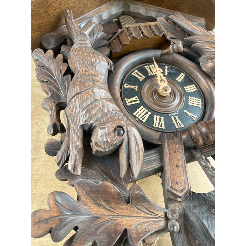 196 - German Carved Wood, Musical Hunting Cuckoo Clock