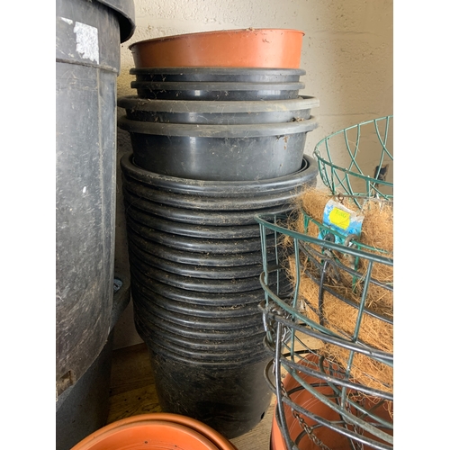 310 - Huge Collection of Plastic Plant Pots, Tubs and Hanging Baskets