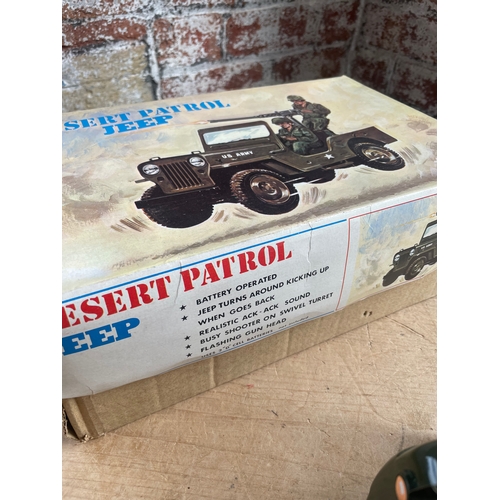 116 - Japanese Tinplate Battery Operated Dessert Patrol Jeep By Modern Toys. Boxed In Good Condition.