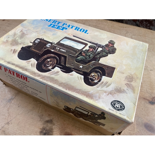 116 - Japanese Tinplate Battery Operated Dessert Patrol Jeep By Modern Toys. Boxed In Good Condition.