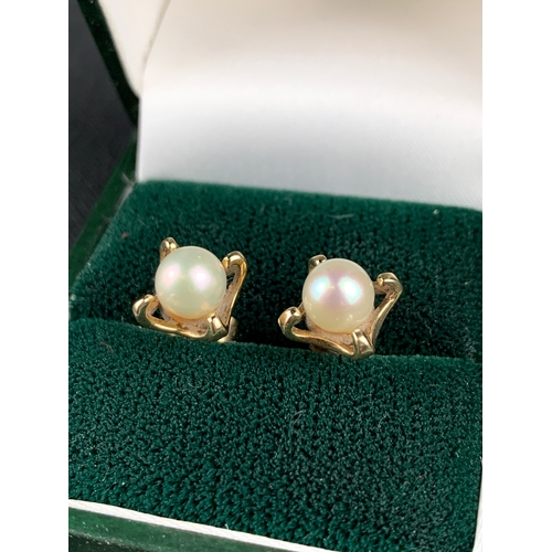 39 - Pearl (and what is Tested to be 18ct Gold) Earrings - Hallmark on post too worn to make out - Butter... 