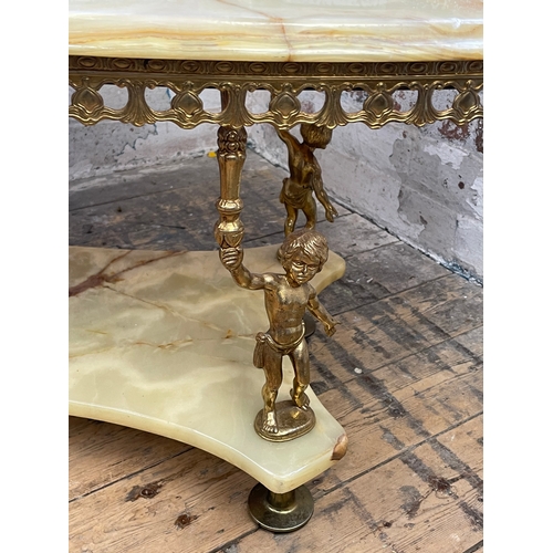 385 - Hollywood Regency Onyx & Gilt Table With Cherub Detail Legs