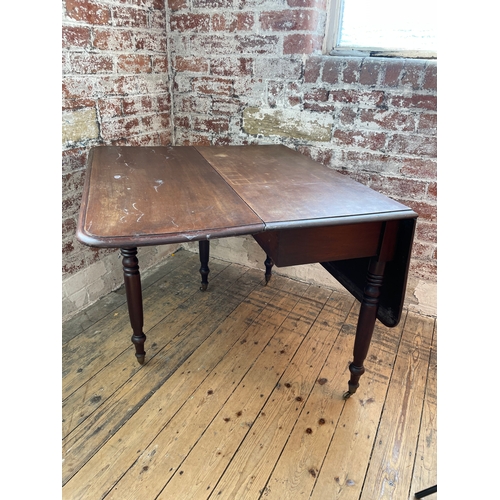 405 - Antique Gate Leg Tea Table. One Leaf Is Sticking. Brass Castors