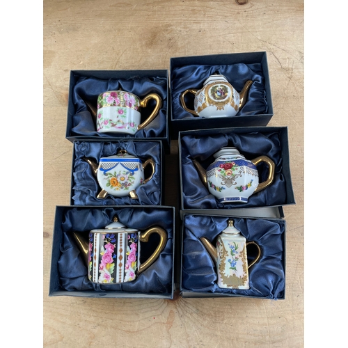 156 - Six Boxed Miniature Teapots