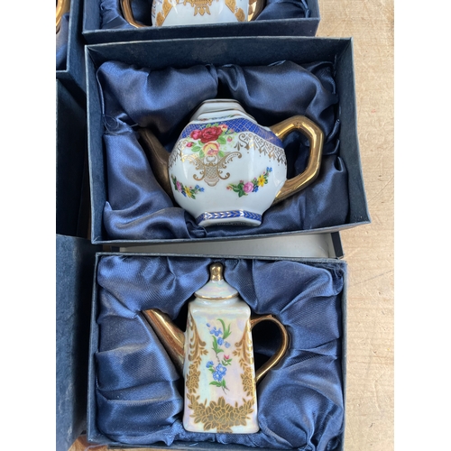 156 - Six Boxed Miniature Teapots