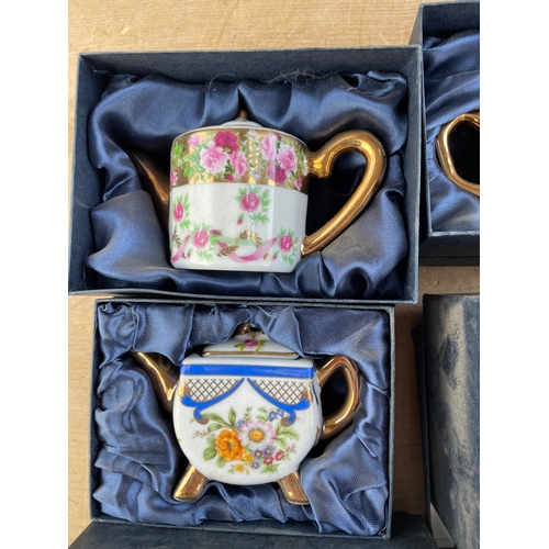 156 - Six Boxed Miniature Teapots