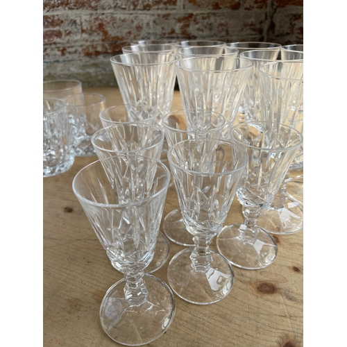 411 - 12 Good Quality Crystal Wine Goblets & 6 Matching Liquer Glasses