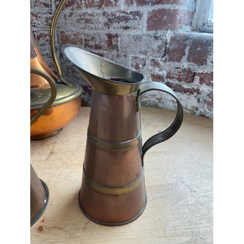 254 - Group Of Copper Jugs Previously Owned By The Sugden Family Of Wood Lane Hall Sowerby Bridge