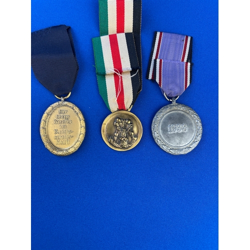 59 - Three WWII World War 2 German Medals. Africa & Italy Medal. RAD Long Service Medal & Air Defence Med... 