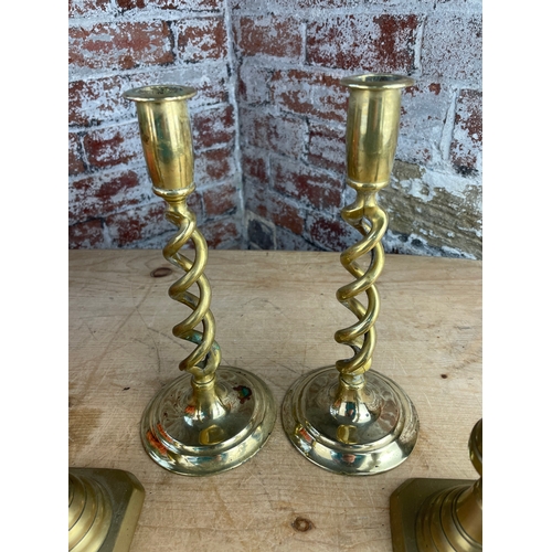 155 - Two Pairs Of Brass Candlesticks