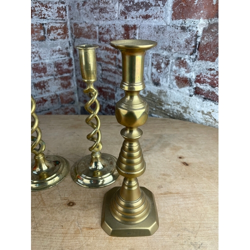 155 - Two Pairs Of Brass Candlesticks