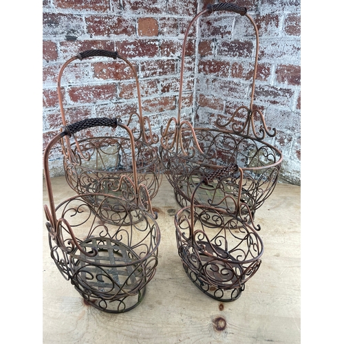 166 - Four Graduated Metal Baskets