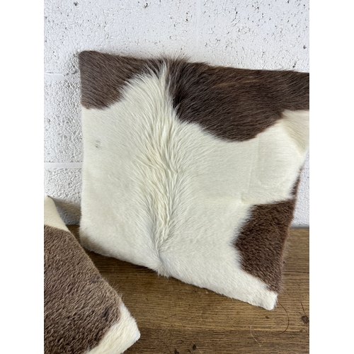 455 - Pair of Cow Skin Cushions