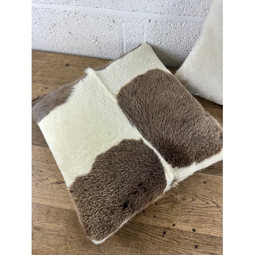 455 - Pair of Cow Skin Cushions