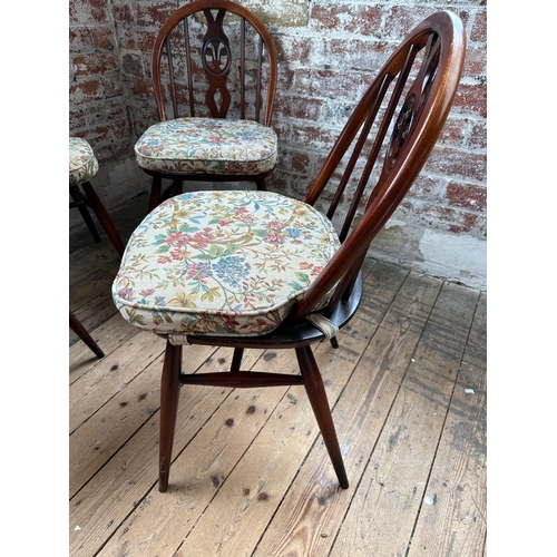 585 - Set of Four Ercol Fleur de Lys Dining Chairs