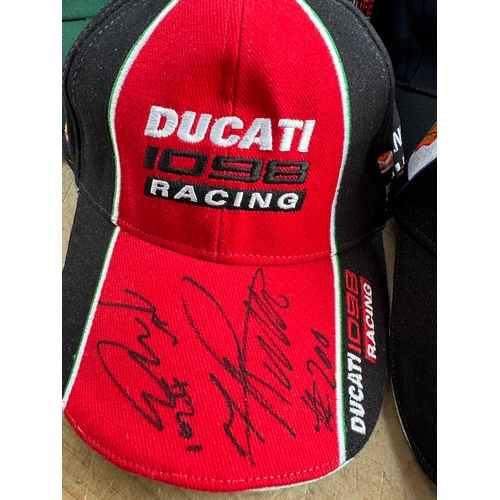 428 - 27 Baseball Caps Inc. Two Signed Ducatti Racing