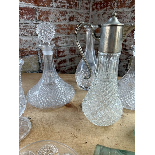 289 - Vintage Glassware Inc. Ships Decanters, Claret Jug, Celery Vase & Bottles.