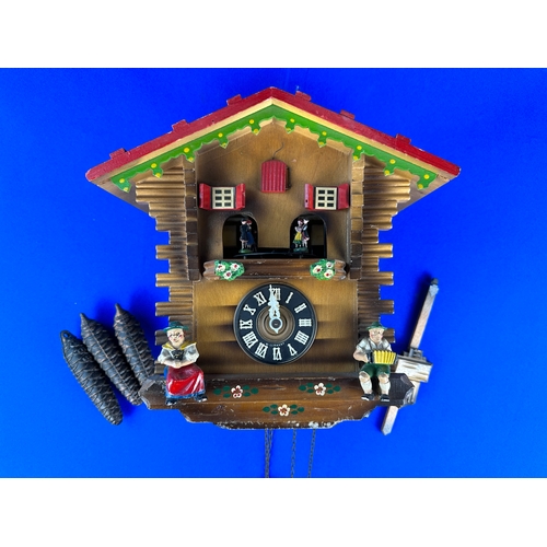 21 - Working Musical Cuckoo Clock with Weights and Pendulum.  West German with Schmeckenbecher Movement