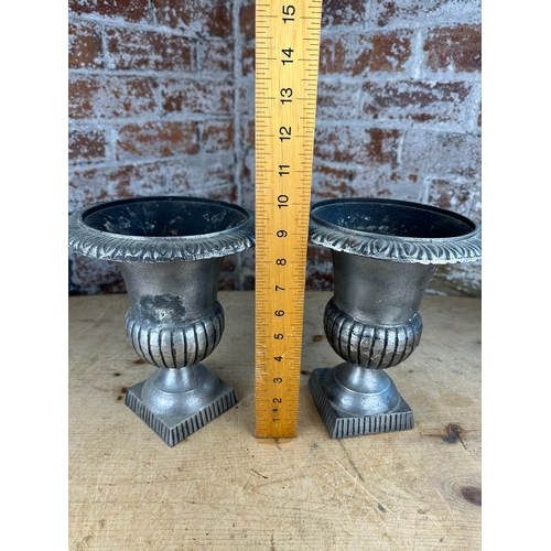 214 - Two Small Cast Metal Urns