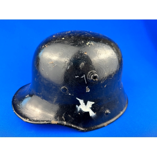 252 - WW1 German Imperial M16 Helmet. Painted Black with Dove Motif.