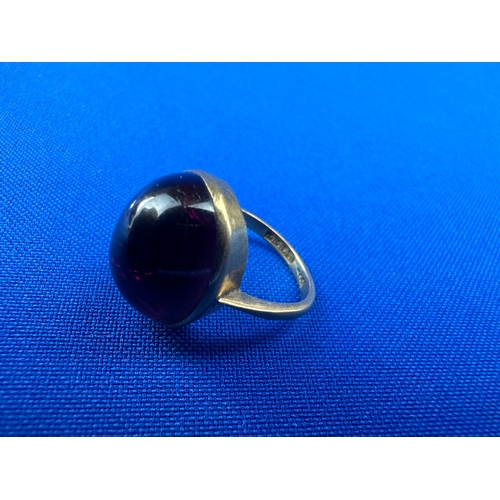 21 - Antique Gold Ring with Large Bezel Mounted Garnet. Unknown Carat Due to Worn Marks. Size J