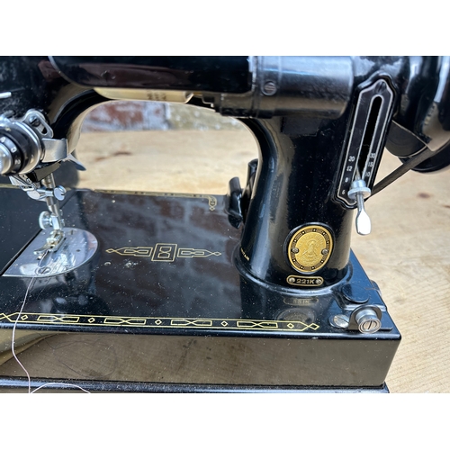 282 - Singer Portable Sewing Machine Model 221k