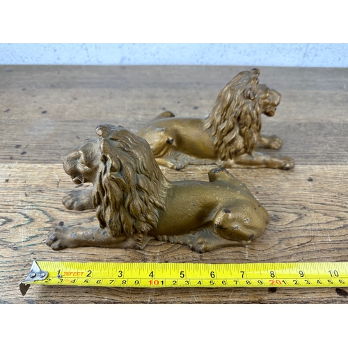 149 - Pair of 1872 Cast Iron Recumbent Lions