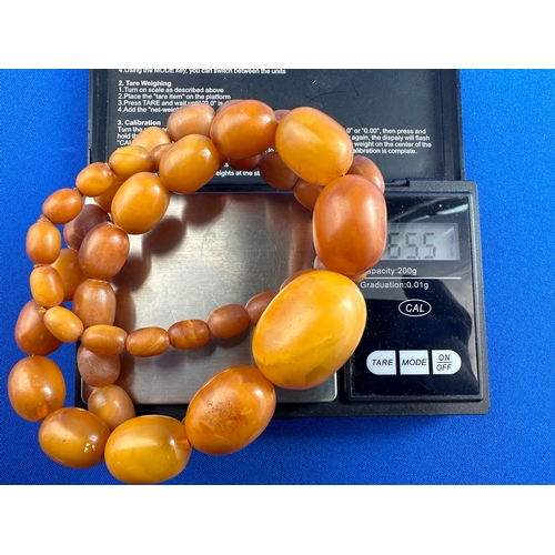 40 - Butterscotch / Egg Yolk Abber Graduated Bakelite Necklace. 65.5g Largest Bead 31mm