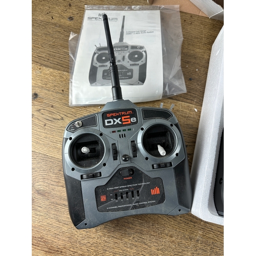 100 - Two Spektrum DX5e 5 Channel Radio Controllers (Boxed one seems unused) Spektrum DX3 and Traxxas Radi... 